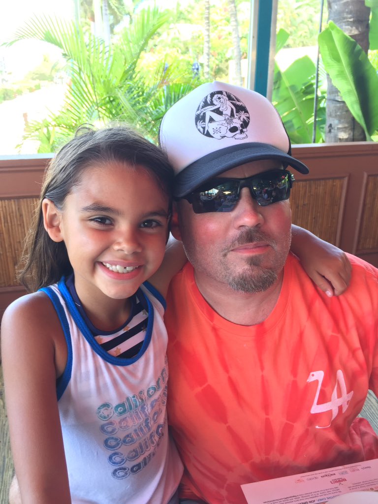 Ariana Greenblatt posing for photograph with her father Shon Greenblatt.